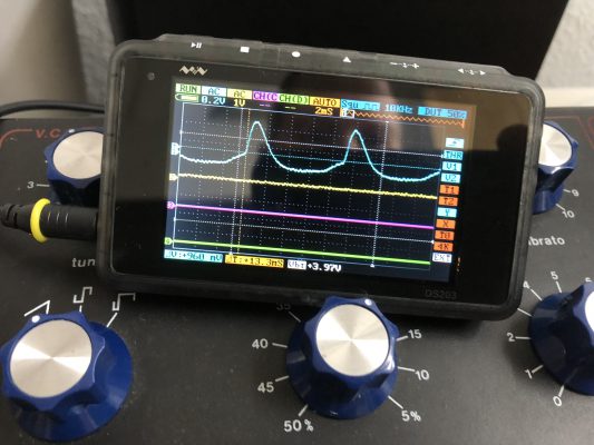 Slightly distorted sawtooth wave, like a rounded shark's tooth