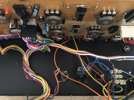 Inside the JEN synth: two wires leading to the filter PCB