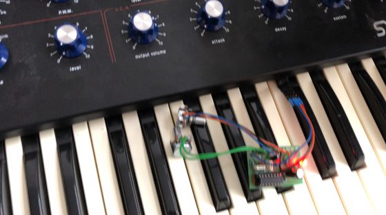 The overdrive circuit lying on the JEN keyboard, wired to a pin-grid connector