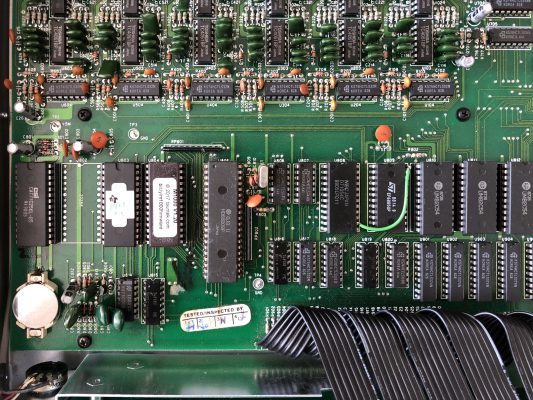 M1000 PCB view with battery in the lower left corner