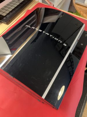 Playstation 3 in black shiny surface, fat body 