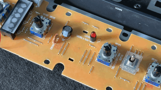 Top view of the panel PCB board with an empty space where a plastic spacer has been clipped in