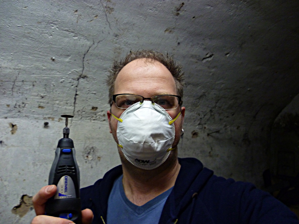 Me with a surgical mask and a Dremel tool