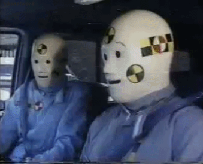 crash test dummies giving each other a thumbs-up